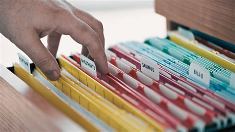 Organizing and keeping financial records and personal documents.